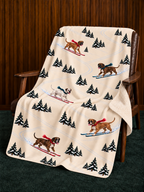 Boxer beige Christmas skiing fleece blanket — chair view