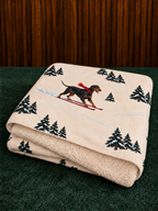 Doberman beige Christmas skiing fleece blanket — folded view
