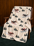English Springer Spaniel beige Christmas skiing fleece blanket — chair view